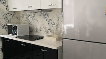 4-Bedroom Family Villa | Private kitchen | Fridge, microwave, stovetop, coffee/tea maker