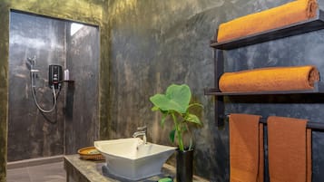 Shower, free toiletries, hair dryer, slippers