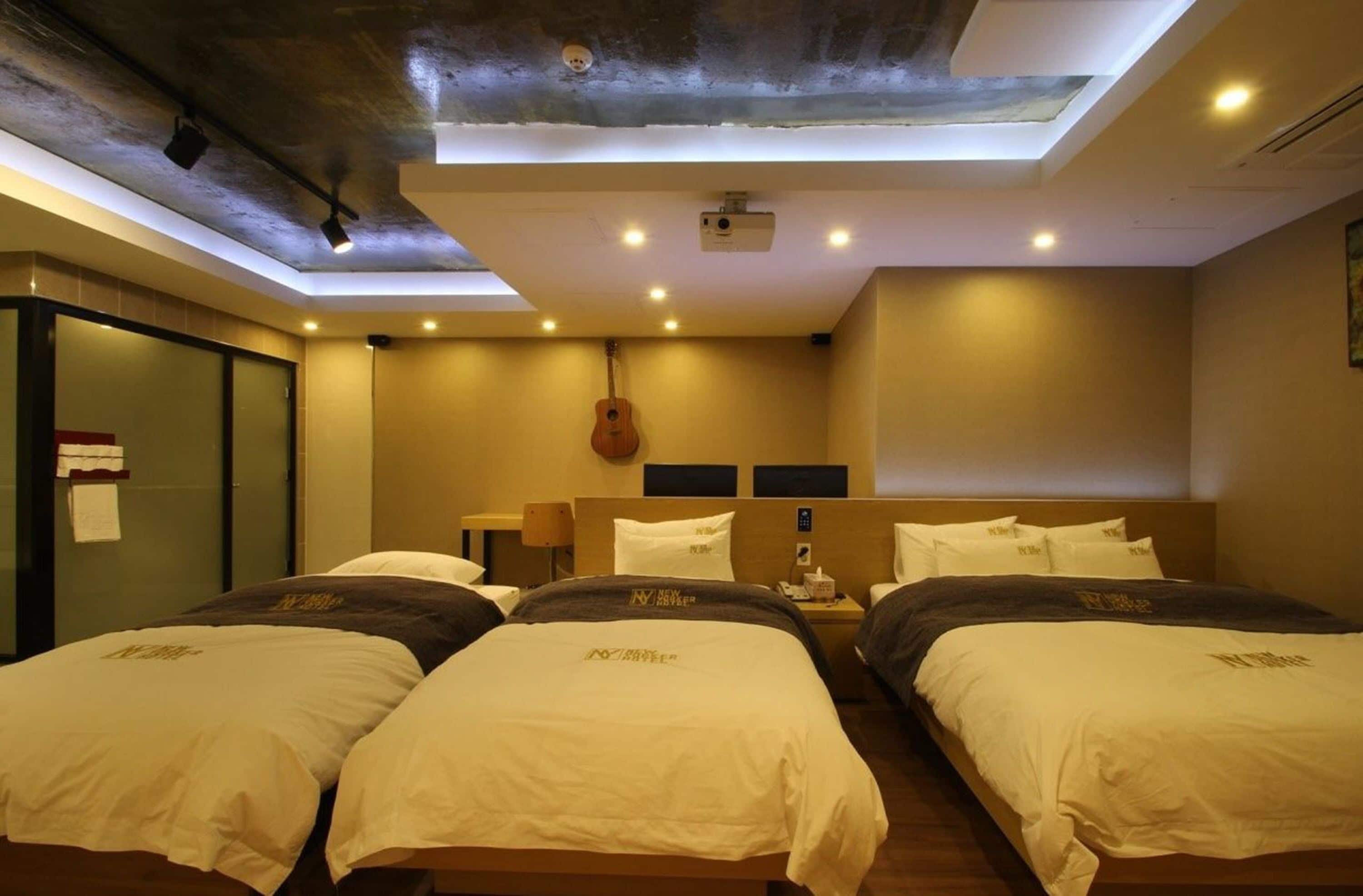 family triple room | premium bedding, down duvets, desk, laptop workspace