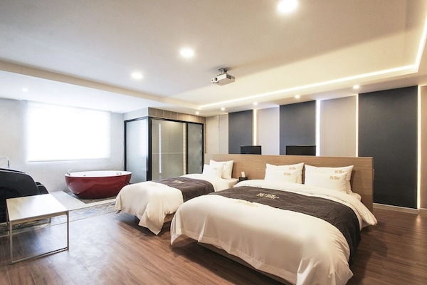 VIP (Family) | Premium bedding, down comforters, desk, laptop workspace