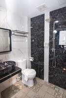 Shower, free toiletries, hair dryer, slippers
