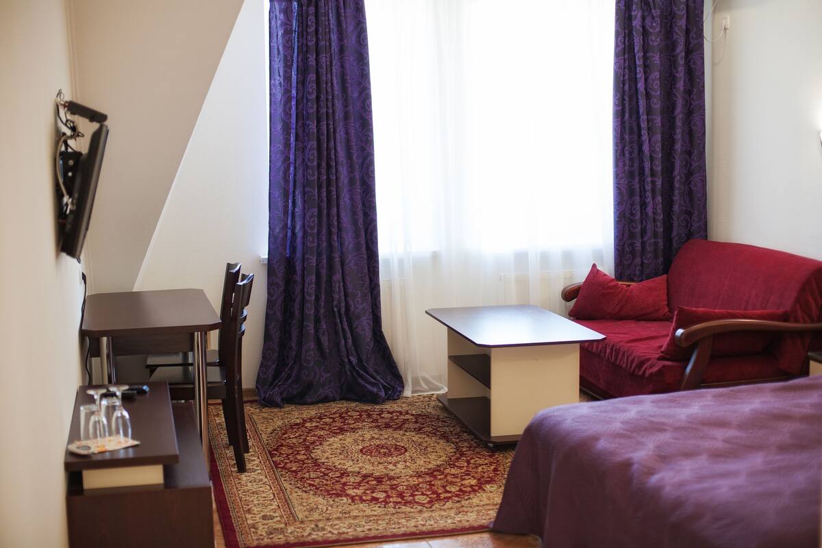 Quarto triplo standard | Escrivaninha, cortinas blackout, Wi-Fi de cortesia
