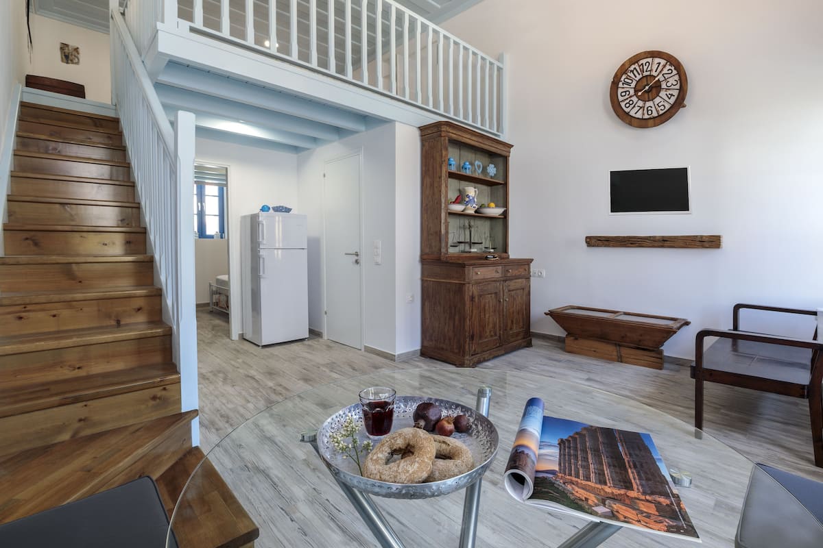 Alloggio su due livelli | Area soggiorno | TV a schermo piatto