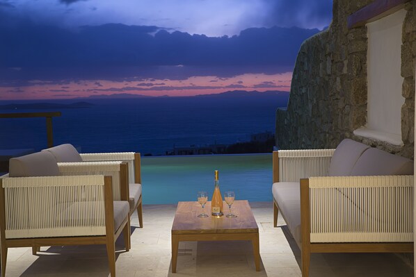 Seasonal outdoor pool, pool umbrellas, pool loungers