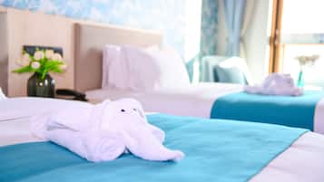 Ropa de cama de alta calidad, cubrecamas y minibar