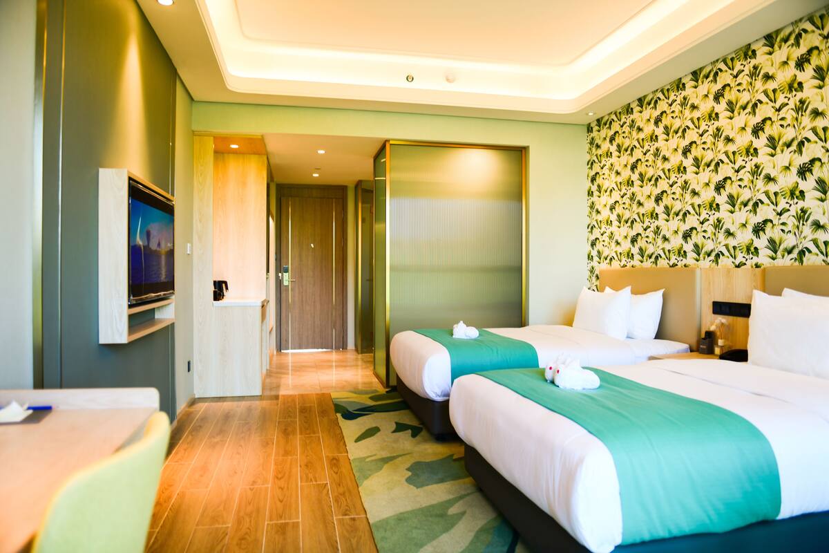 Habitación Deluxe con 2 camas individuales | Ropa de cama de alta calidad, edredones de plumas, minibar y caja fuerte