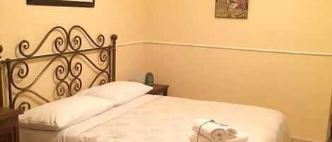 Family Quadruple Room, City View | Frette Italian sheets, premium bedding, down comforters