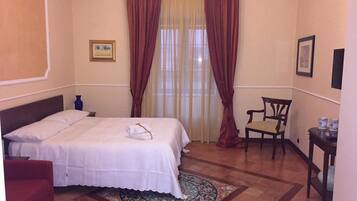 Family Quadruple Room, City View | Frette Italian sheets, premium bedding, down comforters