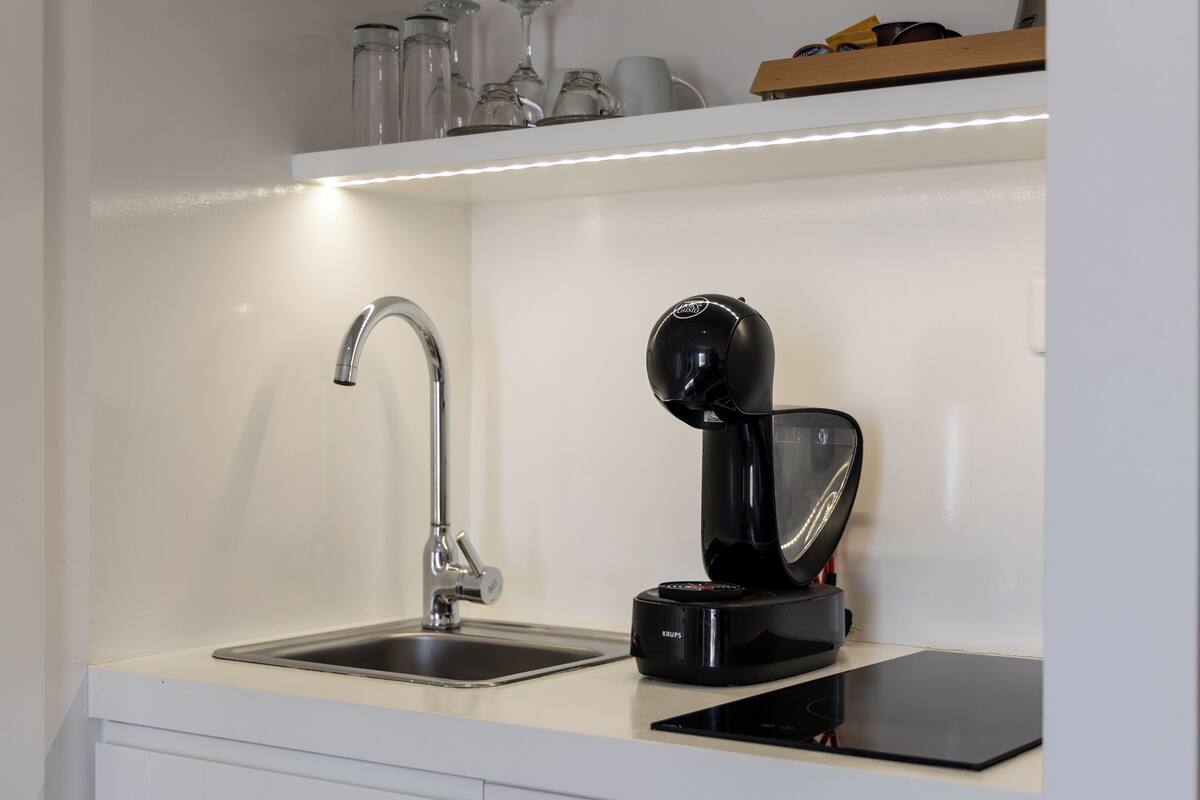 superior suite | minibar, in-room safe, desk, blackout curtains