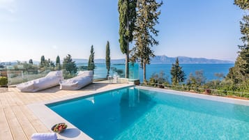 Indoor pool, outdoor pool, pool umbrellas, sun loungers