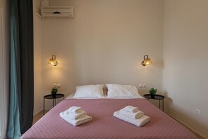 2 chambres, coffres-forts dans les chambres, fer et planche à repasser