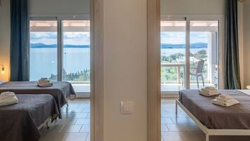 Apartment, 2 Bedrooms, Sea View | 2 bedrooms, iron/ironing board, free WiFi, bed sheets