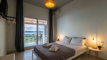 Appartamento, 2 camere da letto, vista mare | 2 camere, ferro/asse da stiro, Wi-Fi gratuito, lenzuola