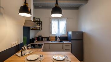 Apartment, 1 Bedroom, Sea View | Private kitchen | Full-size fridge, stovetop, espresso maker, coffee/tea maker