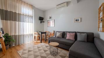 Apartment, 1 Bedroom, Terrace, Ocean View | Living area | Flat-screen TV