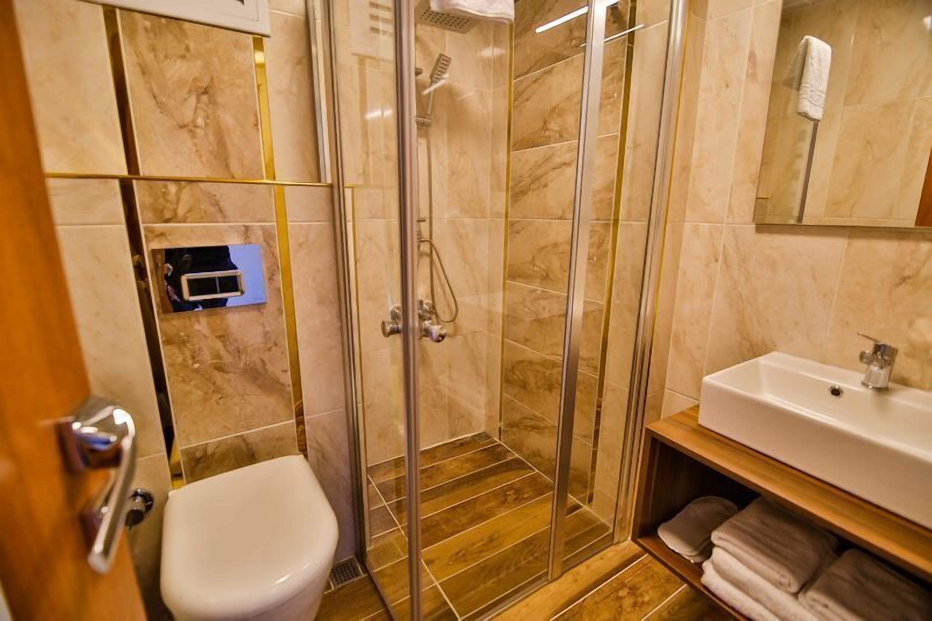 shower, free toiletries, hair dryer, slippers