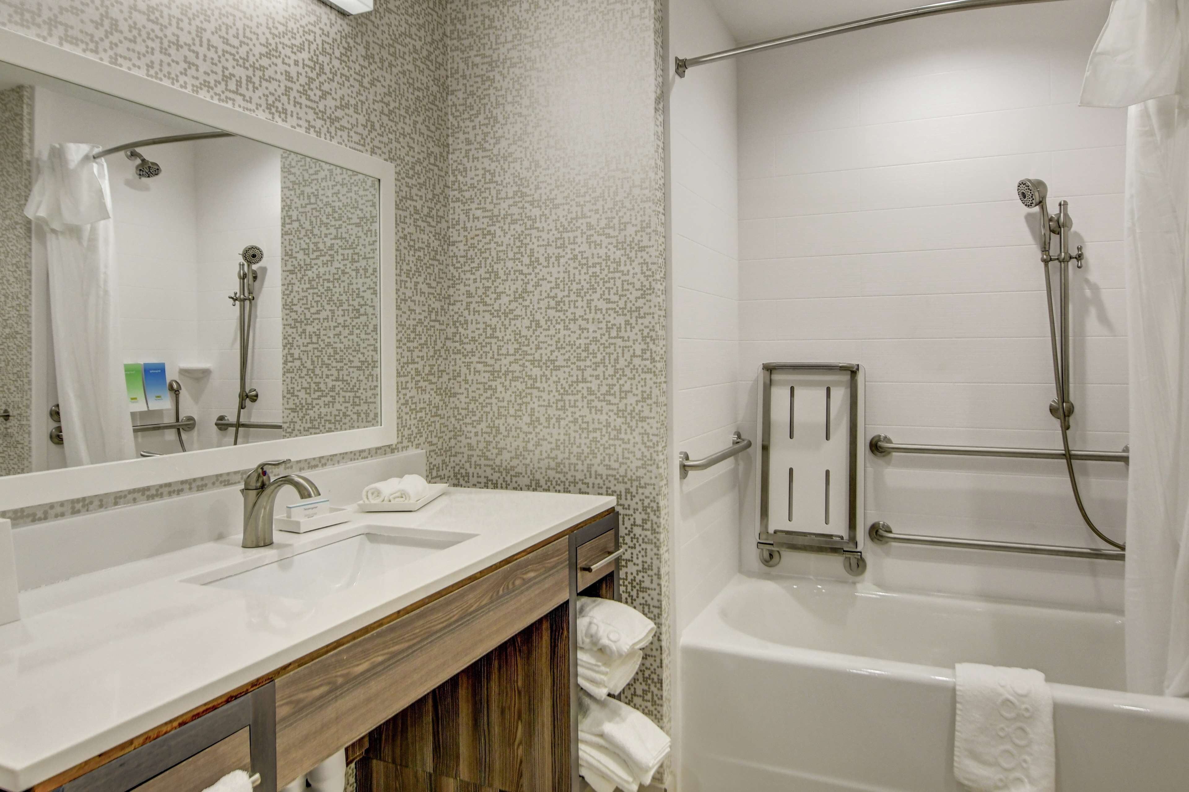 suite, 1 king bed, accessible, bathtub (mobility & hearing) | bathroom | hair dryer, towels, soap, shampoo