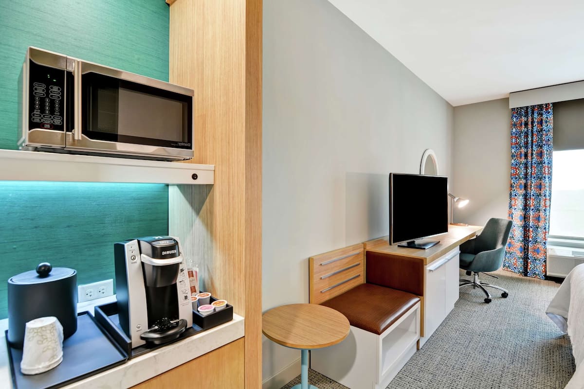 Hypo-allergenic bedding, desk, laptop workspace, iron/ironing board