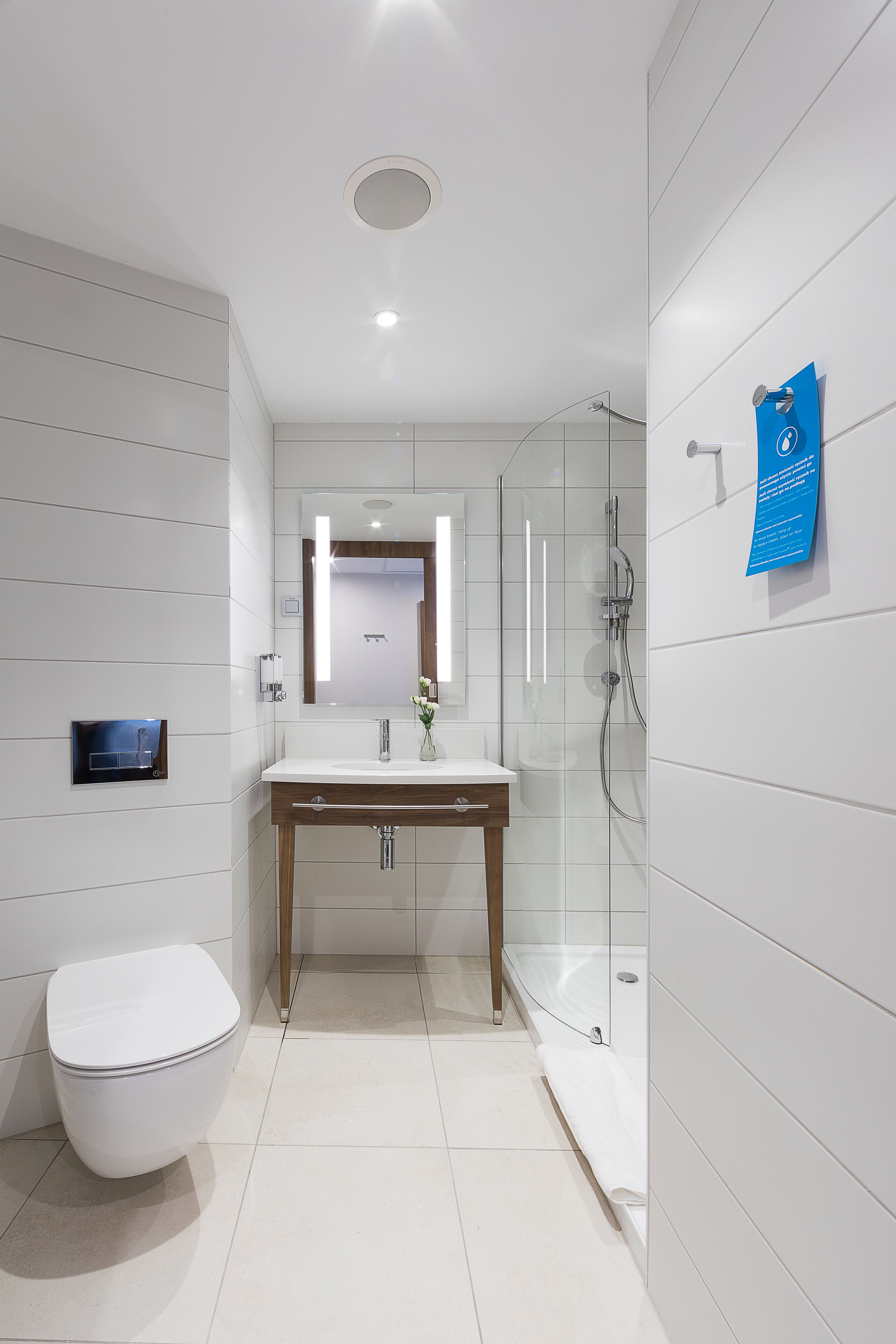 shower, rainfall showerhead, hair dryer, towels