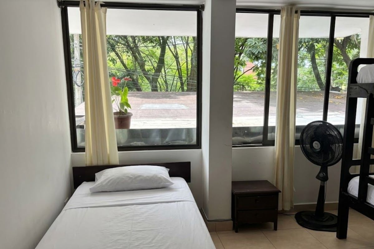 Triple Room, Non Smoking (Shared Bathroom) | Iron/ironing board, free WiFi, bed sheets