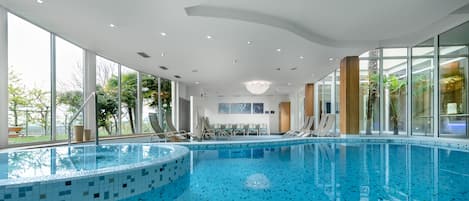 Indoor pool, outdoor pool, open 7:00 AM to 11:00 PM, sun loungers