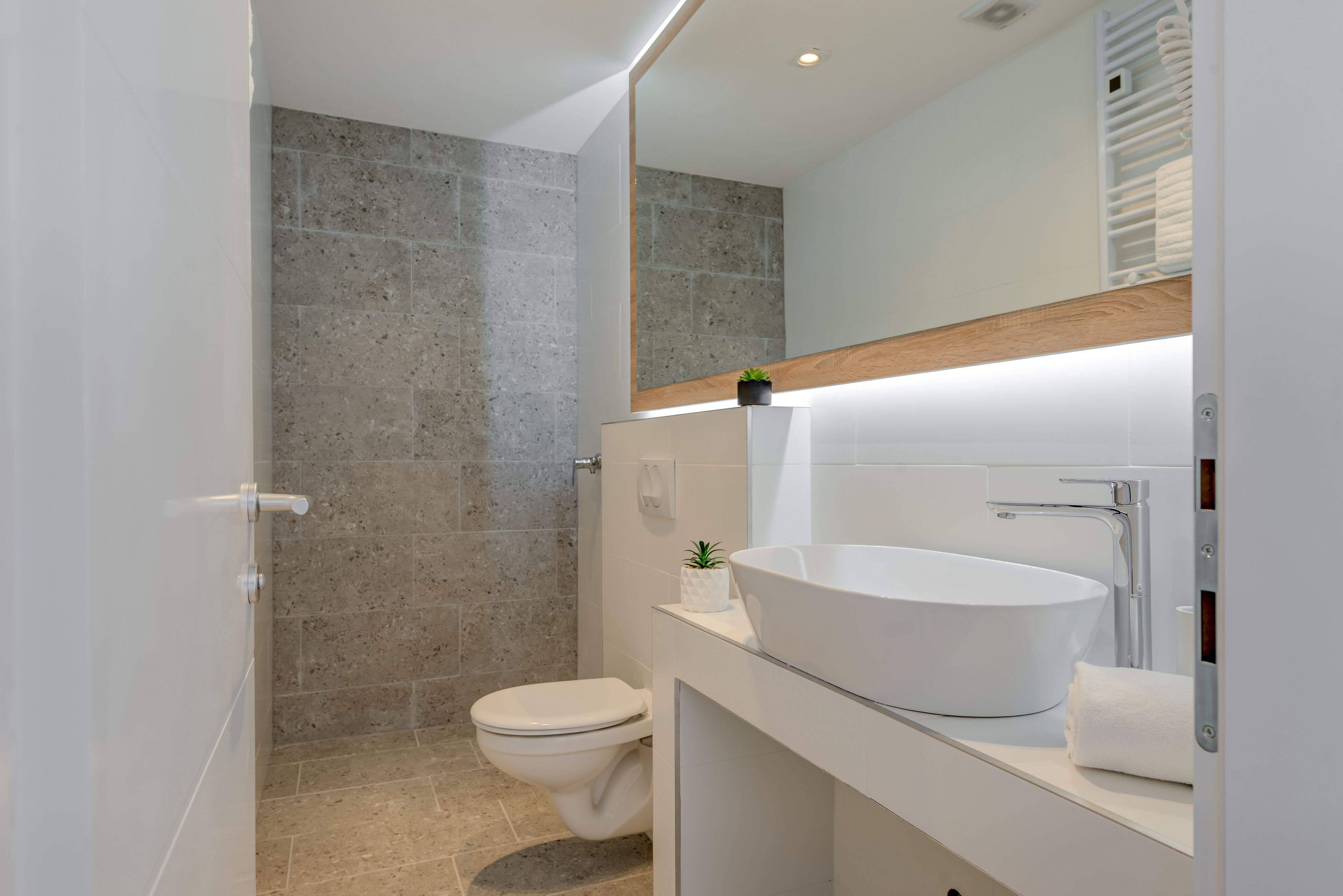 superior triple room | bathroom | shower, rainfall showerhead, free toiletries, hair dryer