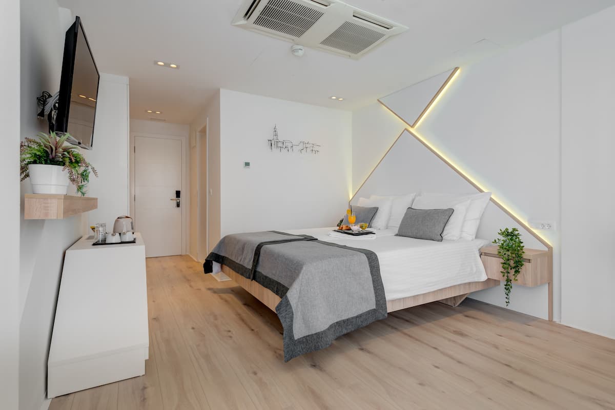 Superior tweepersoonskamer | 2 slaapkamers, luxe beddengoed, Tempur Pedic-bedden, een minibar