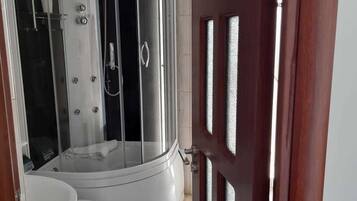 Shower, free toiletries, hair dryer, towels