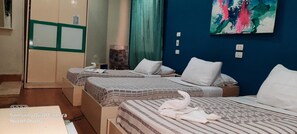 Classic Triple Room | Minibar, blackout drapes, free cribs/infant beds, rollaway beds - Grand Lyly Hotel (Cairo)