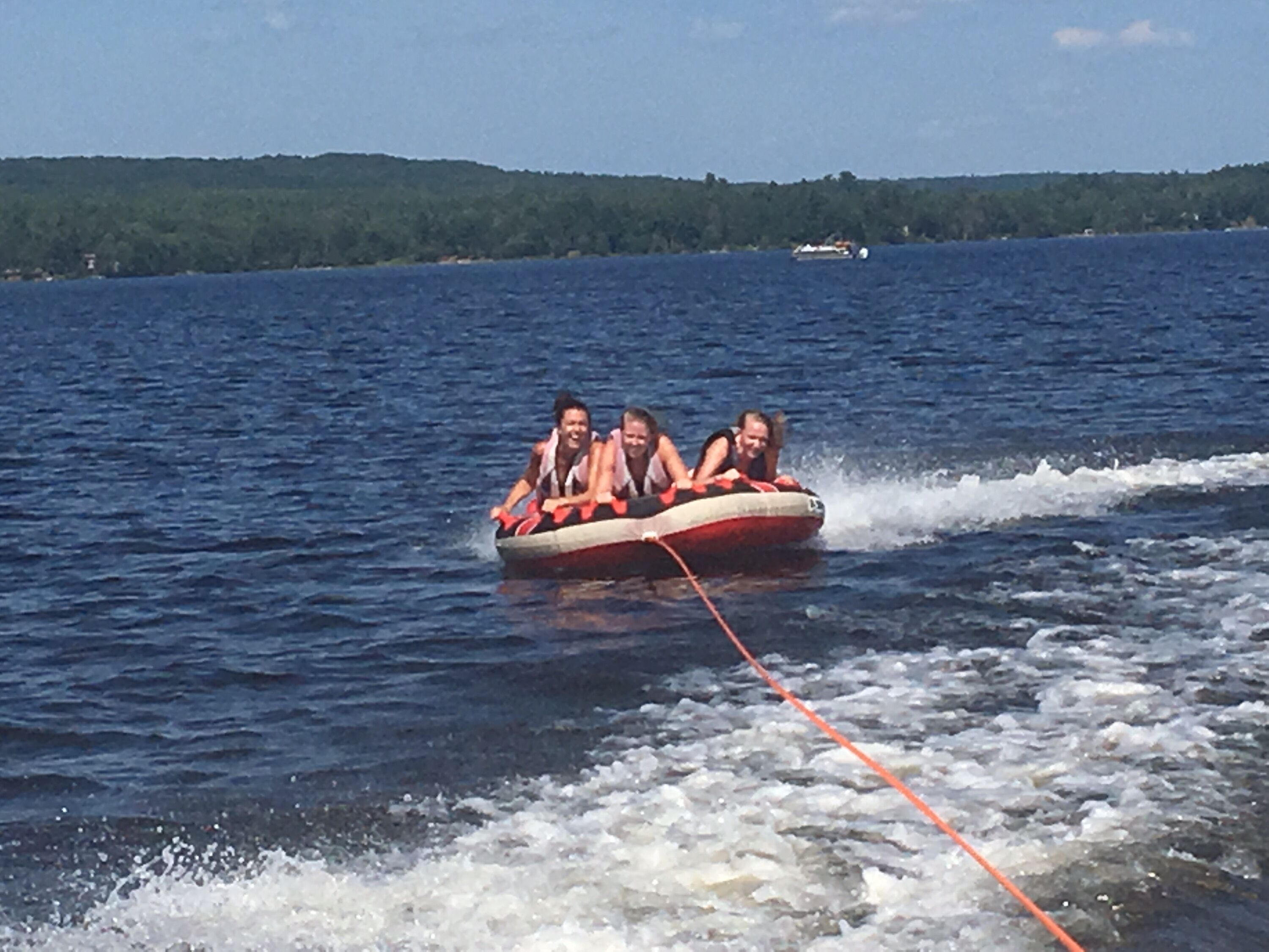 A group of people on a watercraft.