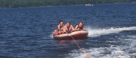 A group of people on a watercraft.