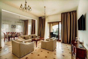 70-inch flat-screen TV with satellite channels, Smart TV, Netflix - Oak Leaf Residences (Kuljace)