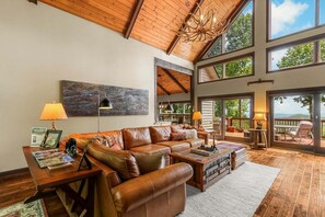 Flat-screen TV, fireplace, DVD player, books - Discover Bear Trail in Boone, NC—a cozy 4-bedroom chalet perfect for 8 guests. (Boone)