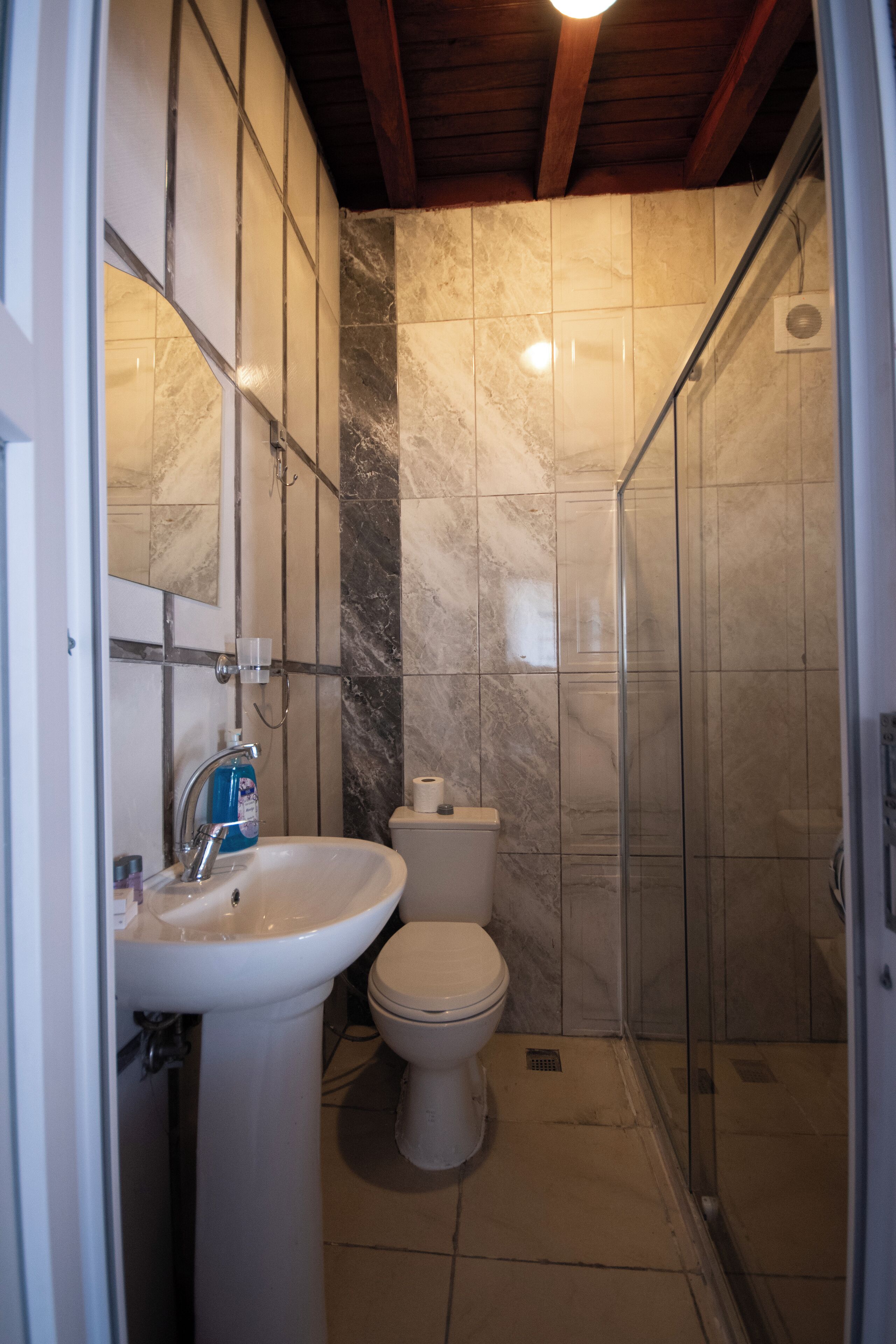 family triple room, multiple beds, garden view | bathroom | shower, rainfall showerhead, free toiletries, hair dryer