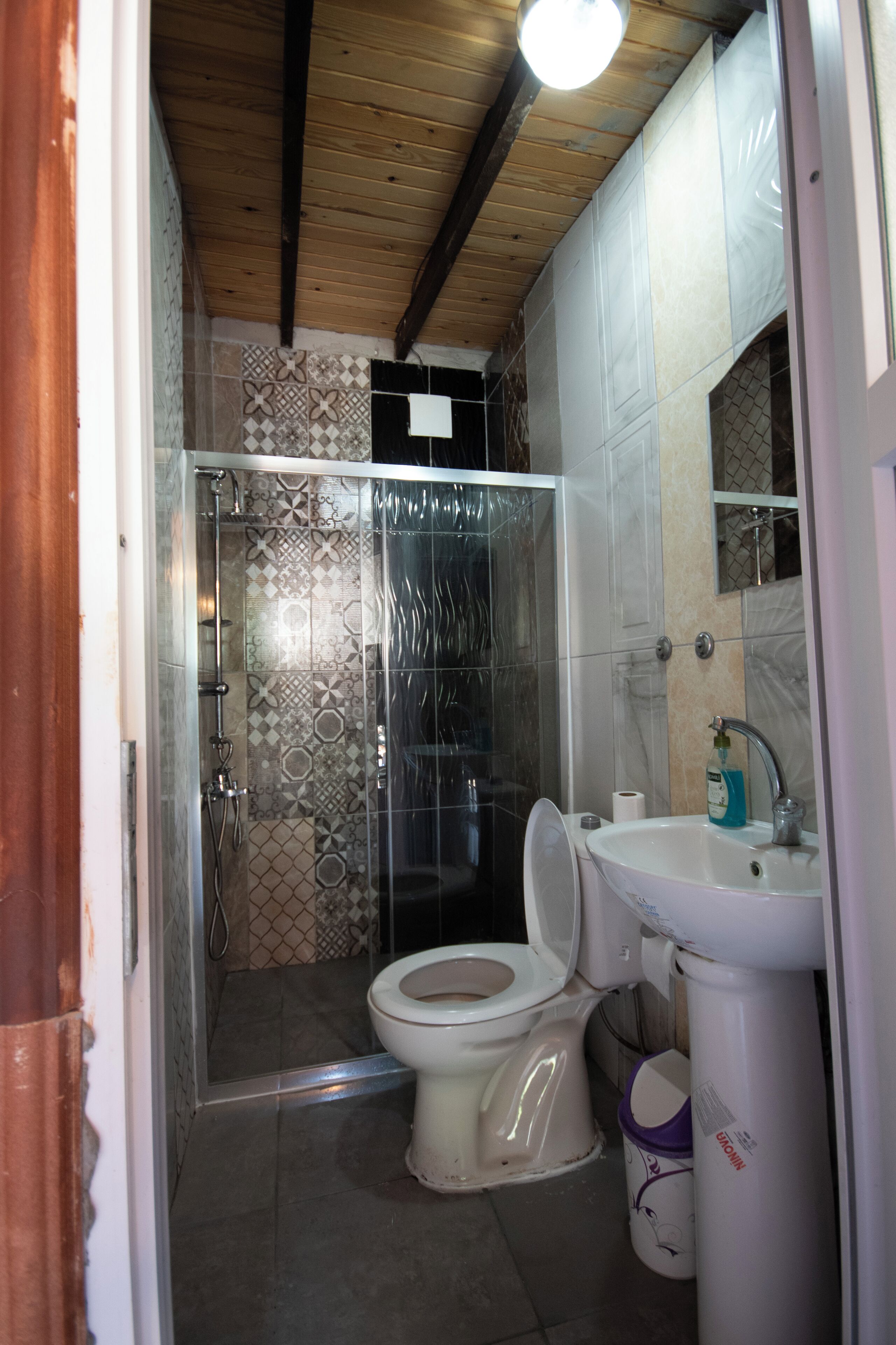 family triple room, multiple beds, garden view | bathroom | shower, rainfall showerhead, free toiletries, hair dryer