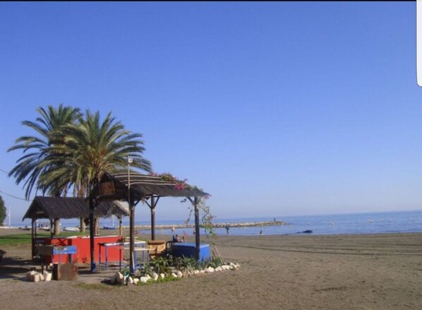 Beach nearby, sun loungers