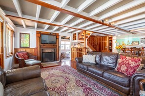 Smart TV, fireplace, books