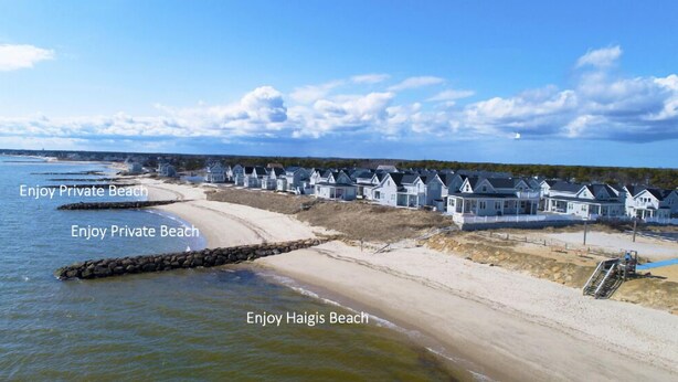 A beachfront property with multiple houses and a private beach. - Two bedroom home located less than 2/10's of a mile to shared/private beach (Dennis Port)