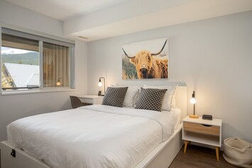 Main bedroom - with dedicated workspace and mountain views