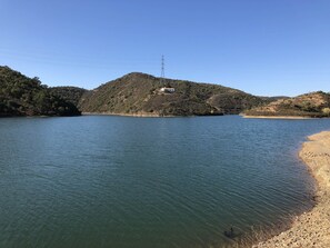 On the beach, sun-loungers, beach towels
