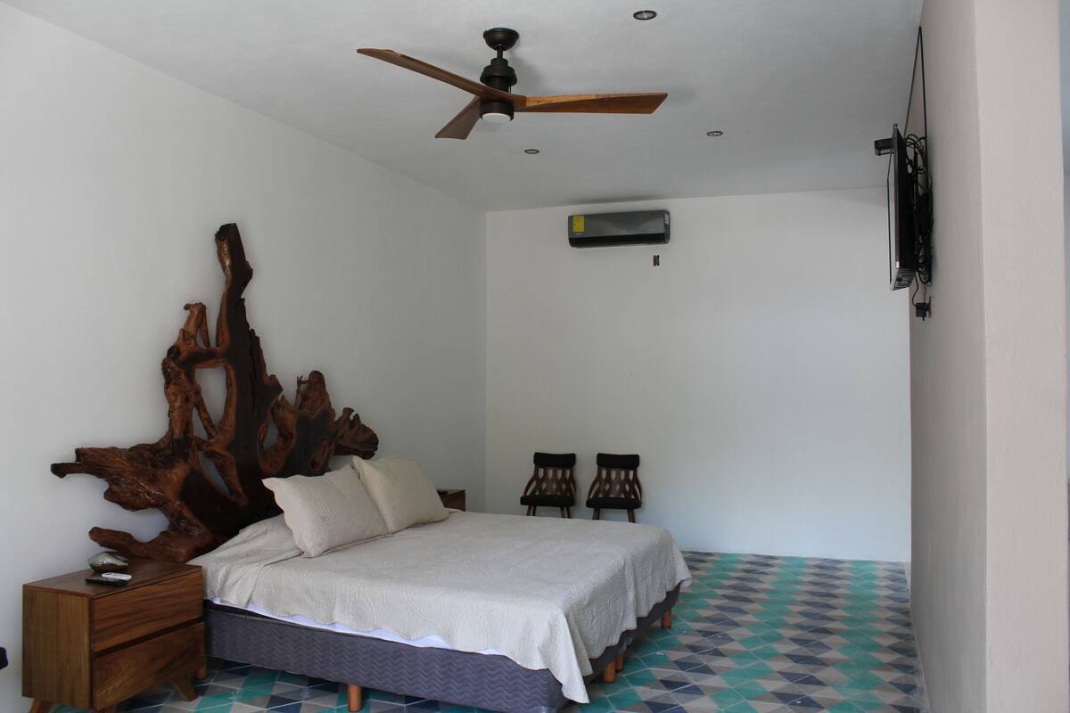 Suite exclusiva, vista al jardín (Nativa Suite) | 1 habitación y caja de seguridad en la habitación