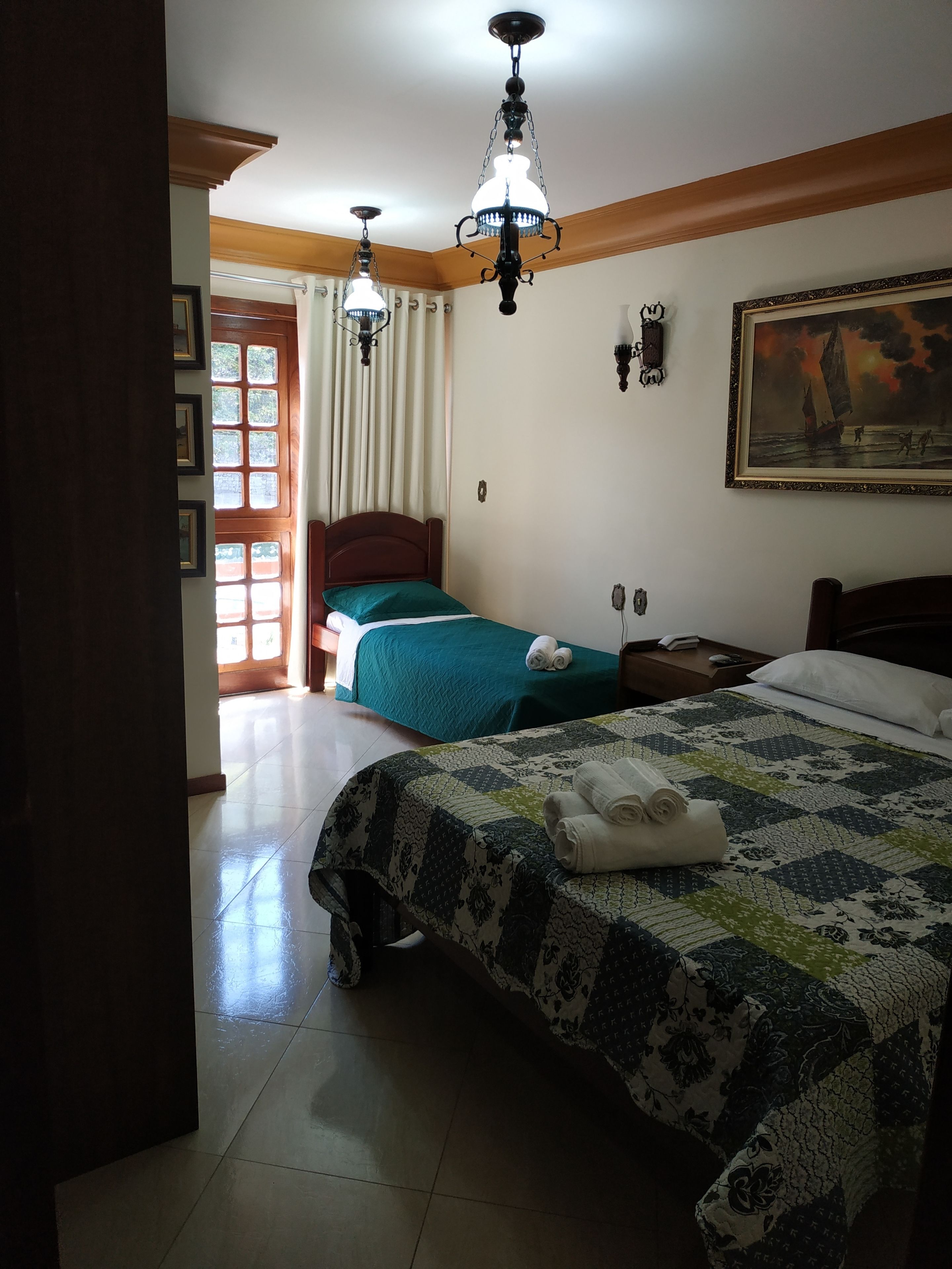 Deluxe Triple Room, Multiple Beds, Mountain View | Individually decorated, individually furnished, free WiFi, bed sheets