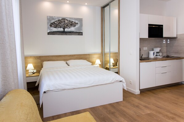 1 dormitorio, caja fuerte, tabla de planchar con plancha y wifi