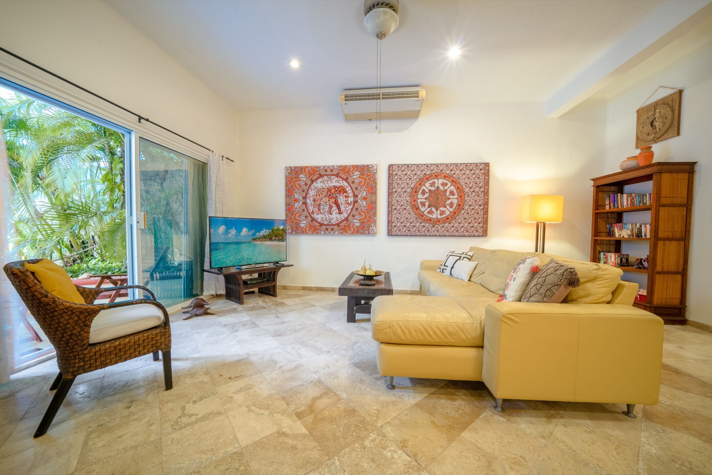 Family Apartment, Multiple Beds | Living room | Flat-screen TV