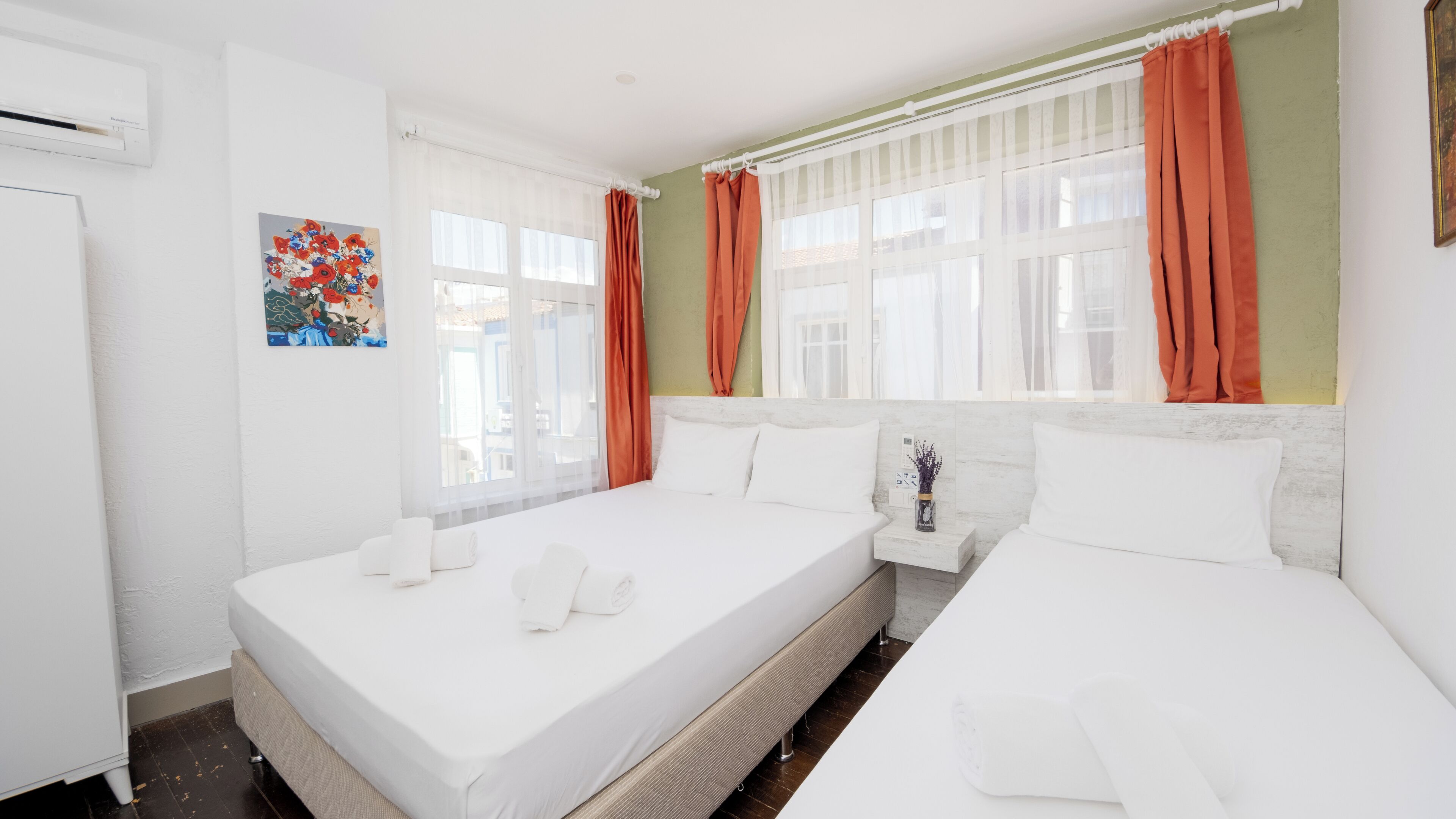 basic triple room, city view | premium bedding, minibar, desk, laptop workspace