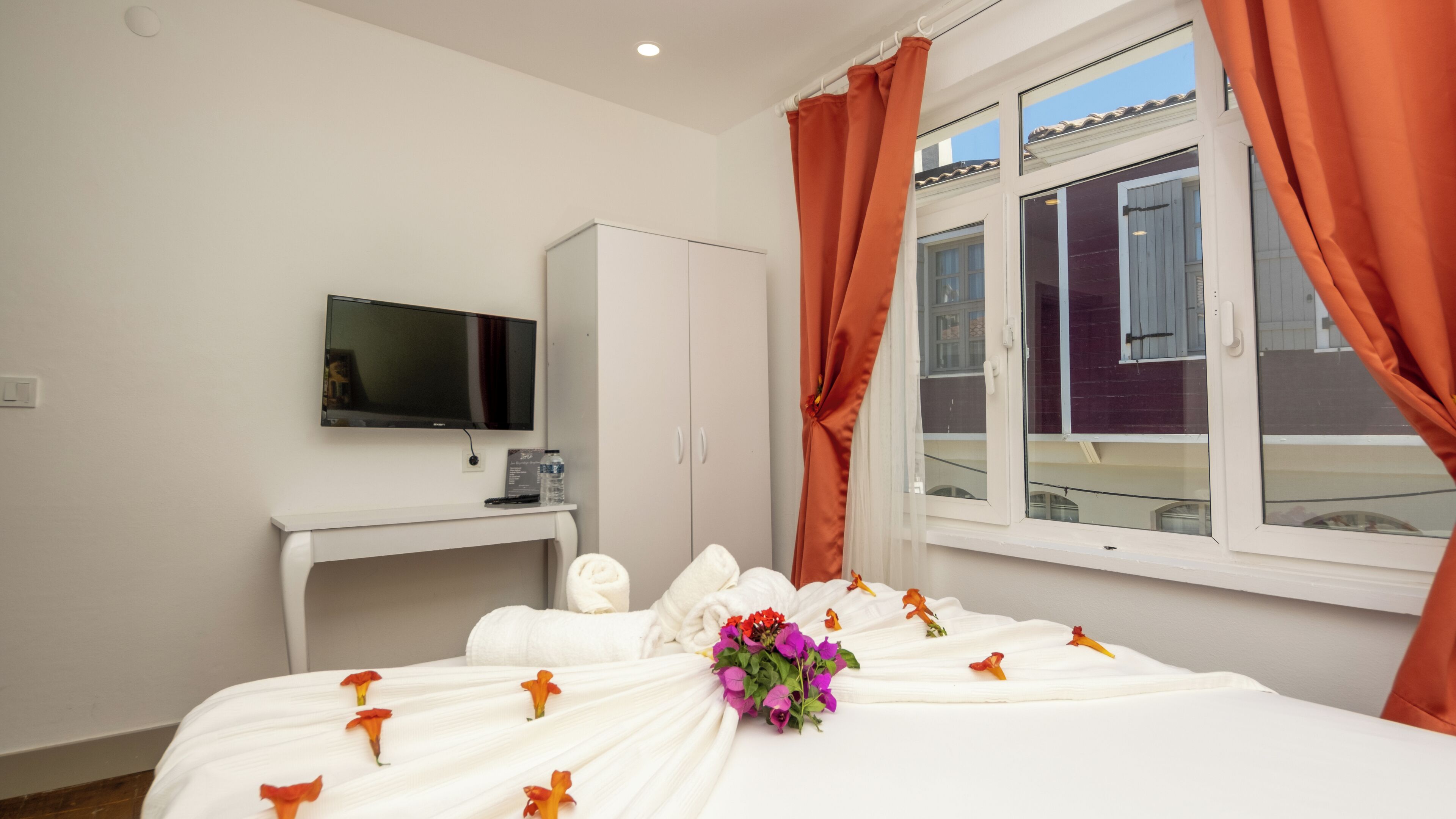 basic double room, city view | premium bedding, minibar, desk, laptop workspace