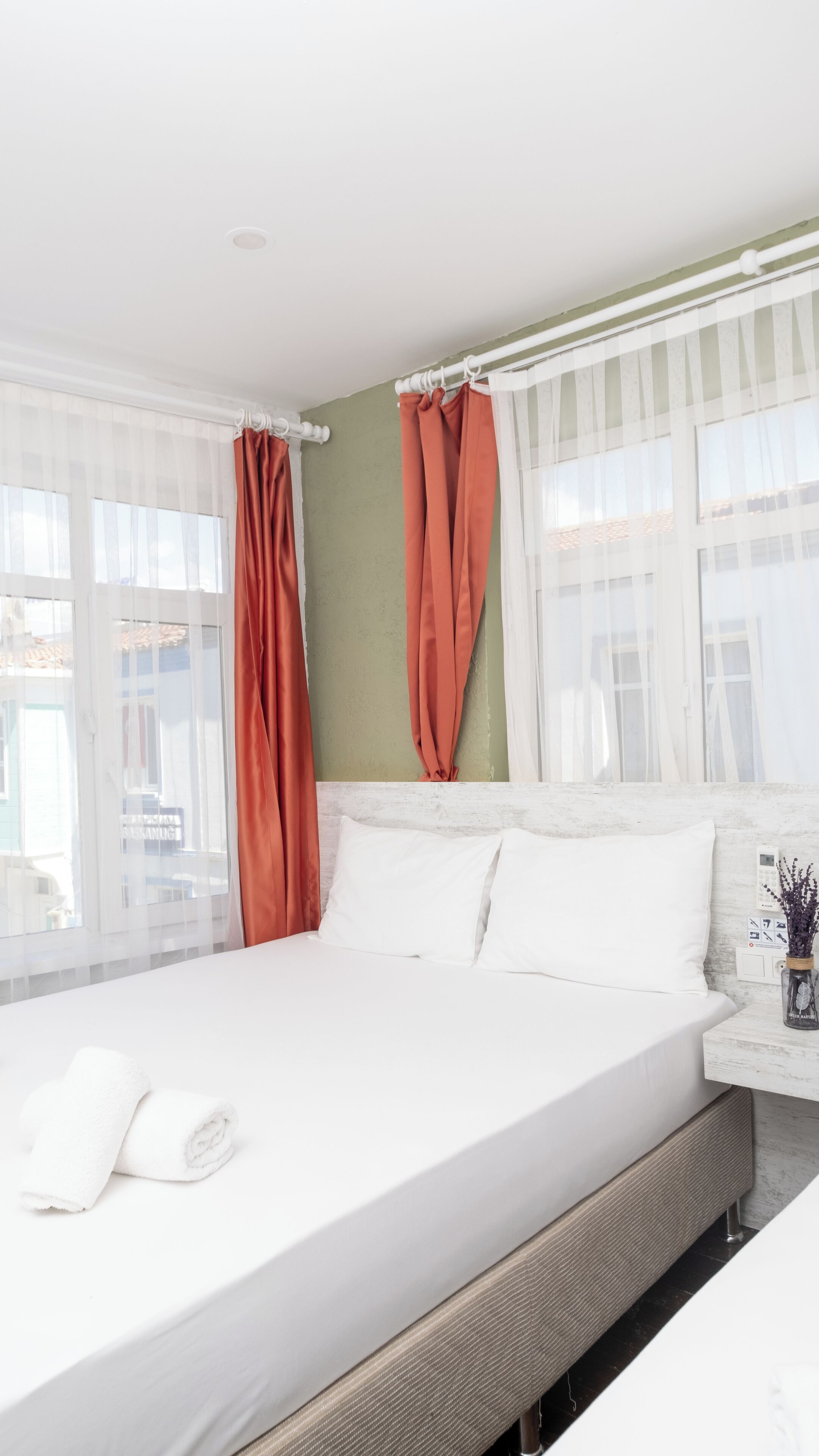 basic triple room, city view | premium bedding, minibar, desk, laptop workspace