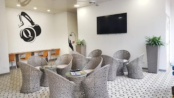 32-inch flat-screen TV with cable channels, TV