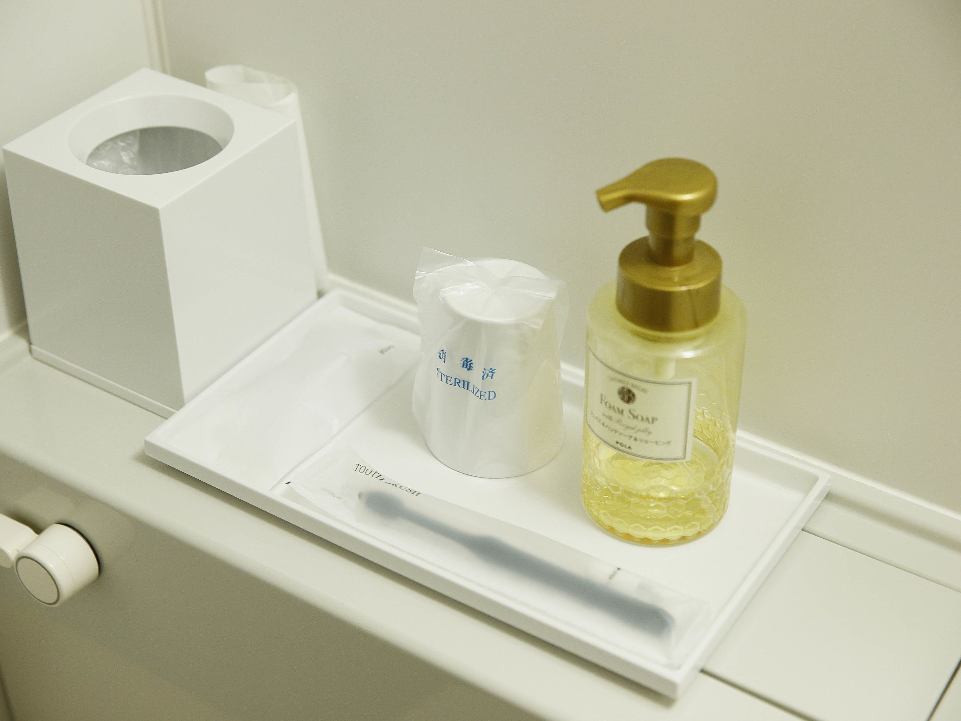 free toiletries, hair dryer, slippers, bidet