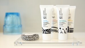 Three tubes of Urban Skincare products on a clear surface. - Holiday Inn Express Melbourne Southbank by IHG (Southbank)